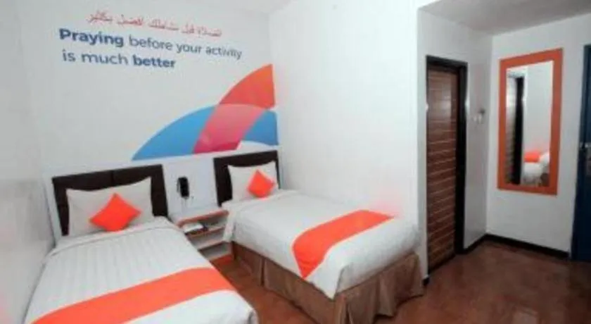 Bed in Oriza Hotel Surabaya