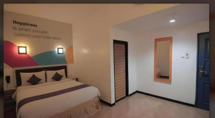 Bed in Oriza Hotel Surabaya