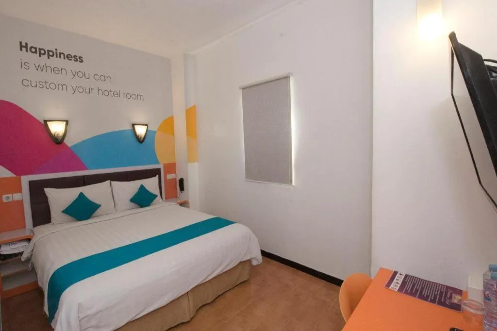 Bed in Oriza Hotel Surabaya