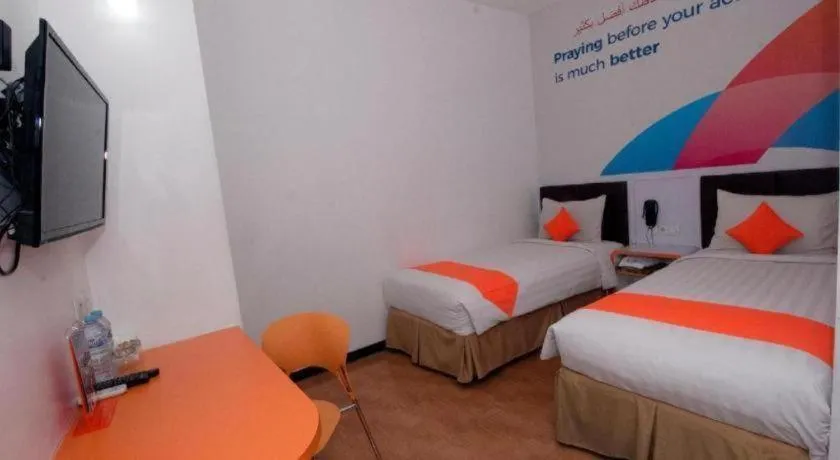 Bed in Oriza Hotel Surabaya
