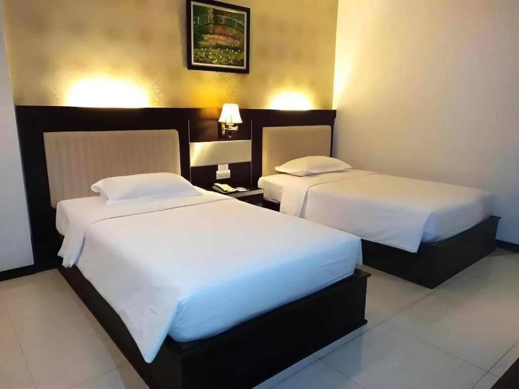 Bed in Zahra Syariah Hotel Kendari