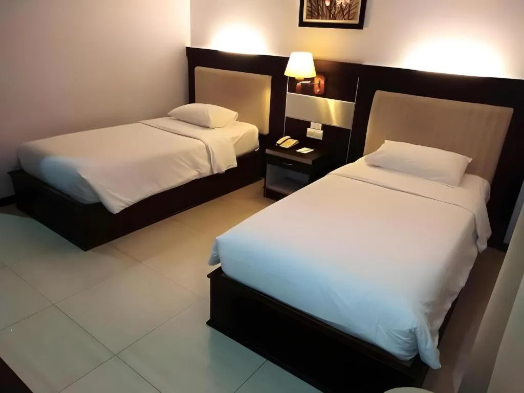 Bed in Zahra Syariah Hotel Kendari
