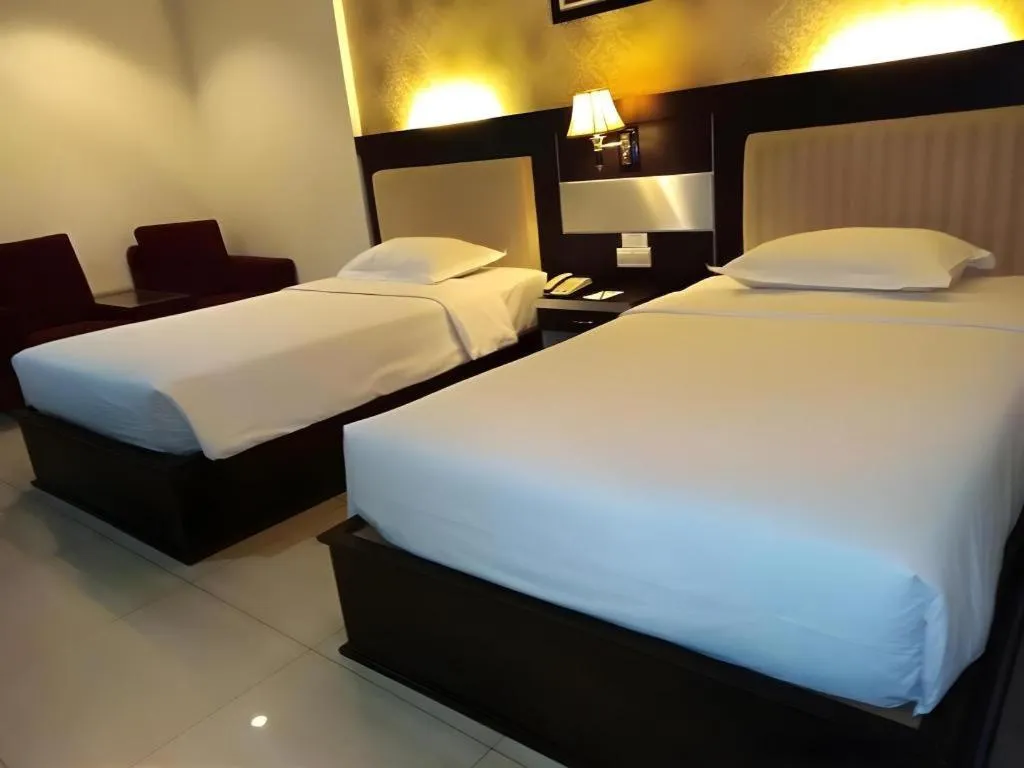 Bed in Zahra Syariah Hotel Kendari
