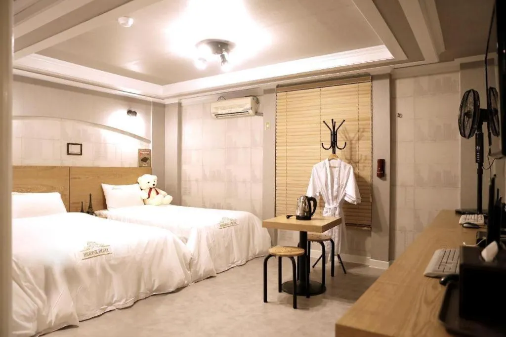 Bed in Gwangju Sejong Hotel