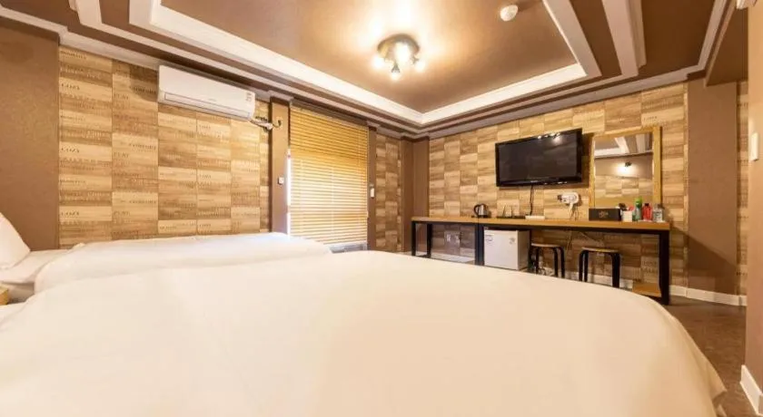 Bed in Gwangju Sejong Hotel