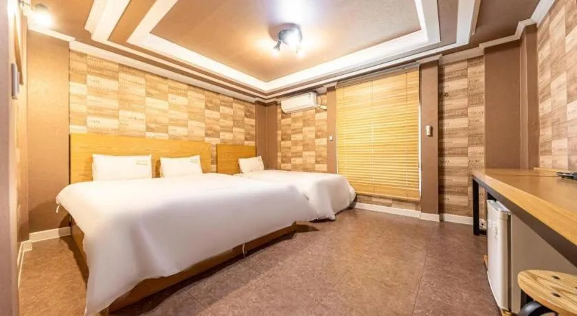 Bed in Gwangju Sejong Hotel