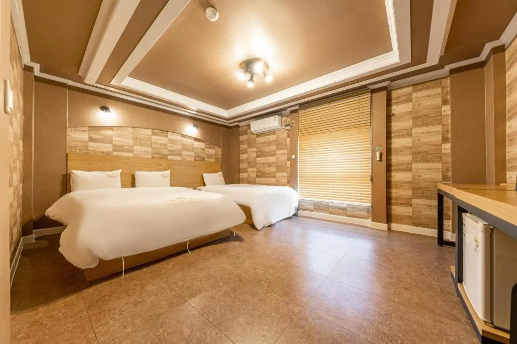 Bed in Gwangju Sejong Hotel