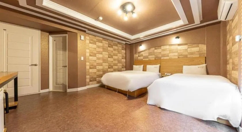 Bed in Gwangju Sejong Hotel