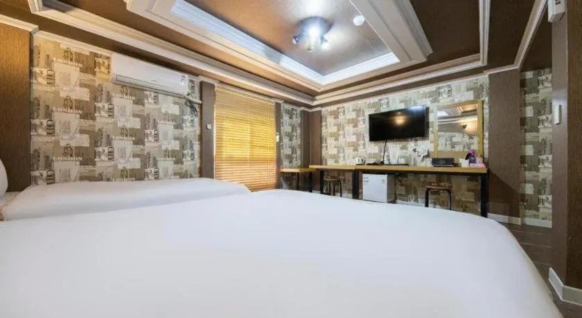 Bed in Gwangju Sejong Hotel