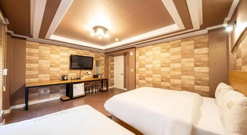 Bed in Gwangju Sejong Hotel