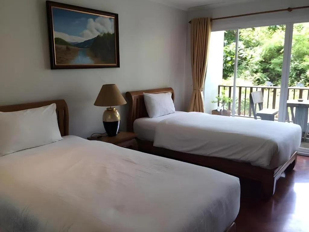 Bed in Chada Thai House