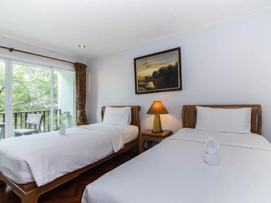 Bed in Chada Thai House