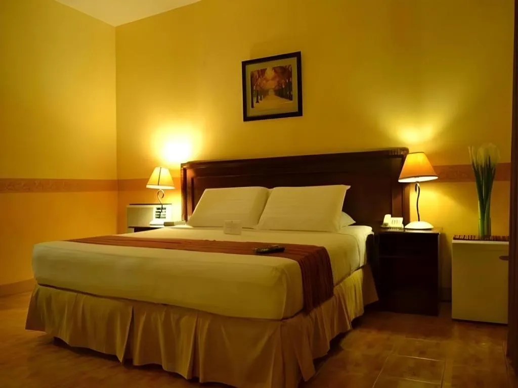 Bed in The Ritz Hotel at Garden Oases