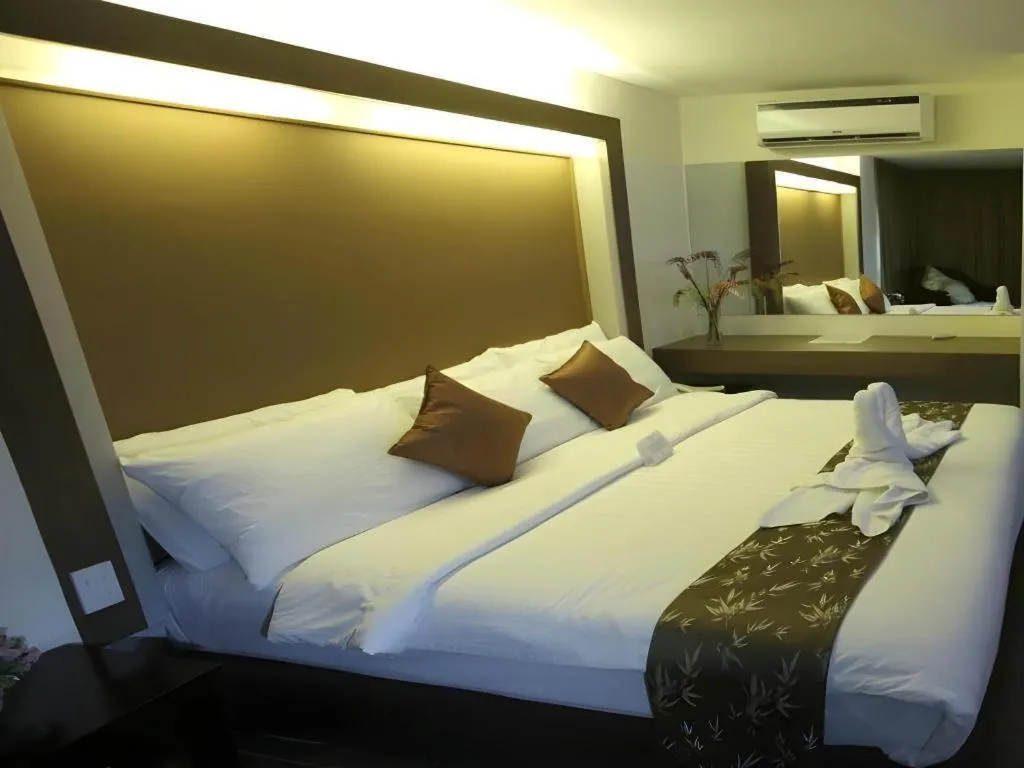 Bed in The Ritz Hotel at Garden Oases