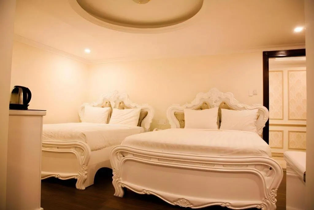 Bed in Hoa Sen Vang Hotel Dalat