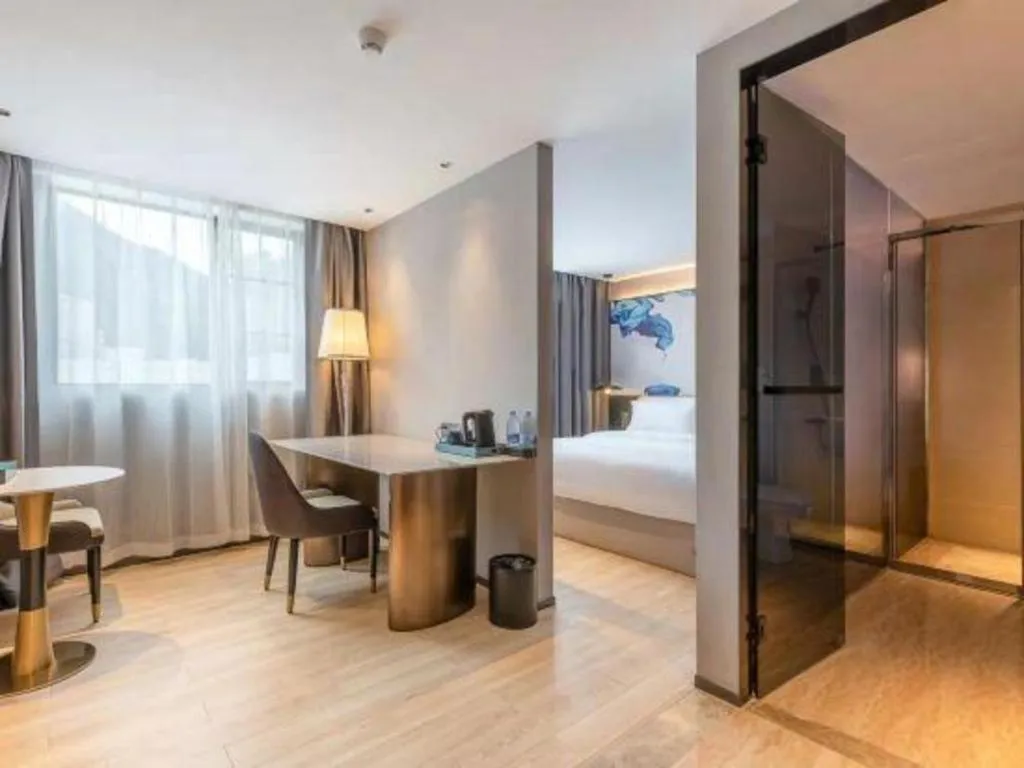 Bed in Bravo Business Hotel