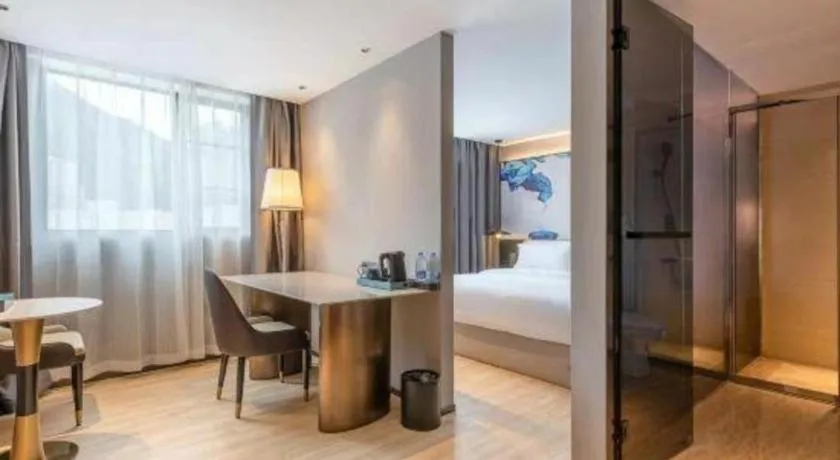 Bed in Bravo Business Hotel