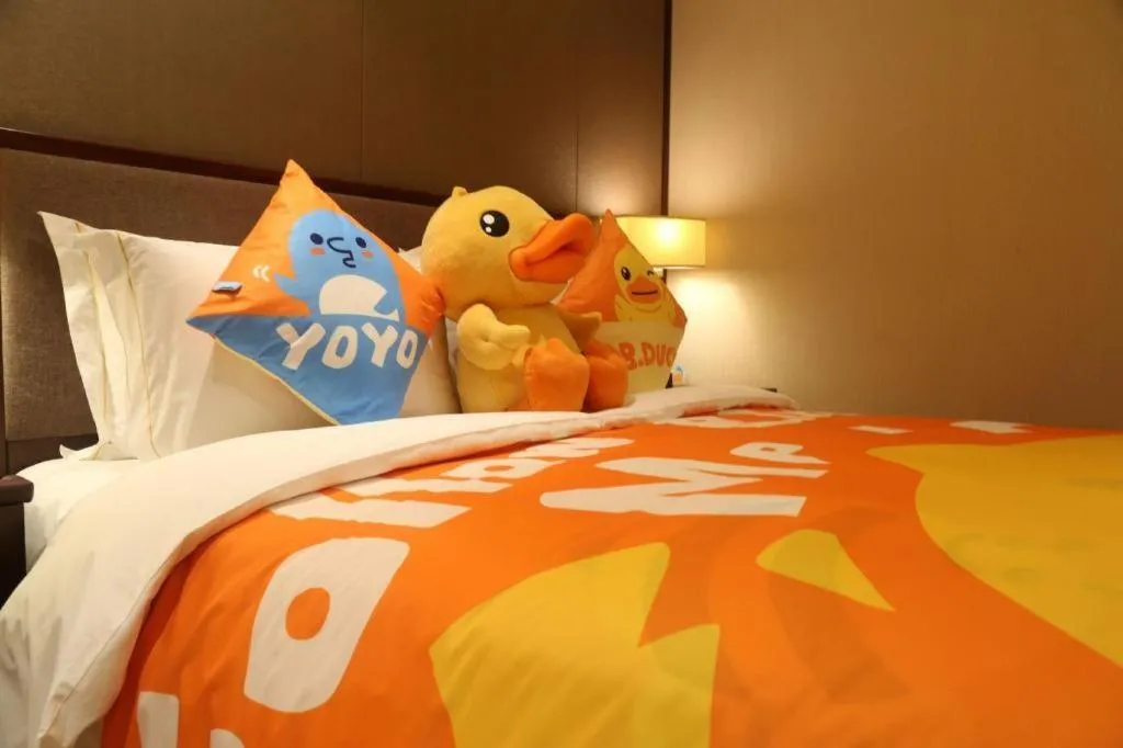 Bed in Sky World Hotel Qingdao