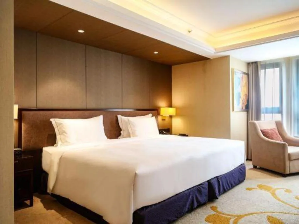 Bed in Sky World Hotel Qingdao