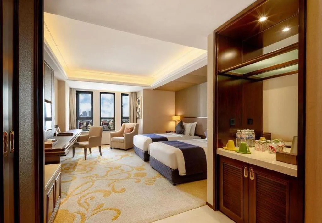 Bed in Sky World Hotel Qingdao