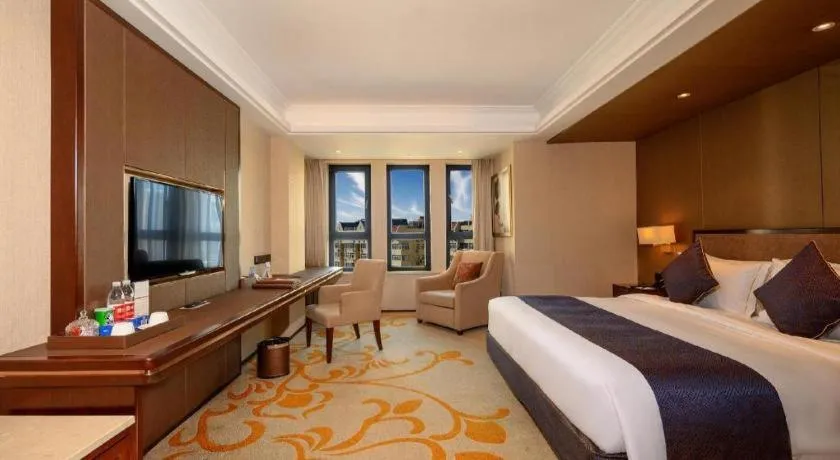 Bed in Sky World Hotel Qingdao