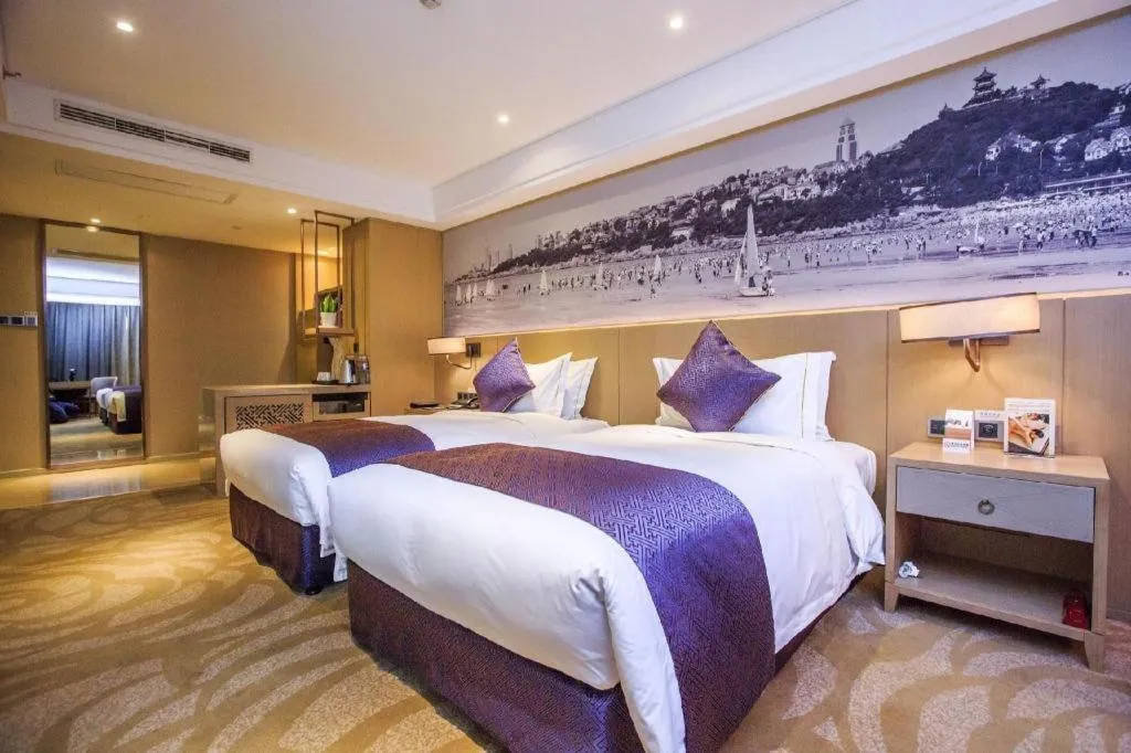 Bed in Sky World Hotel Qingdao