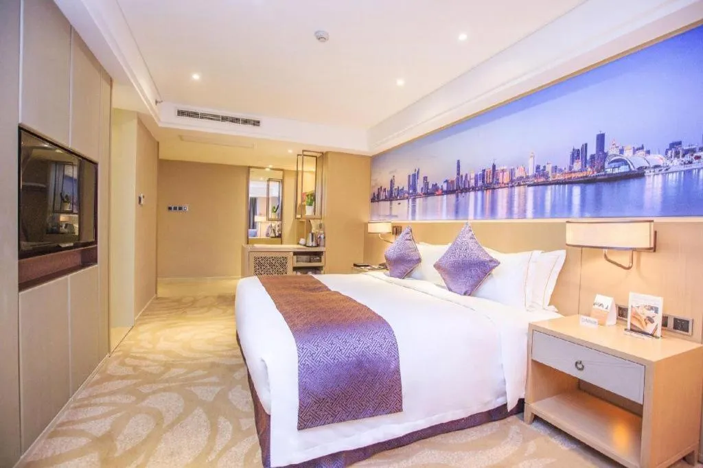 Bed in Sky World Hotel Qingdao