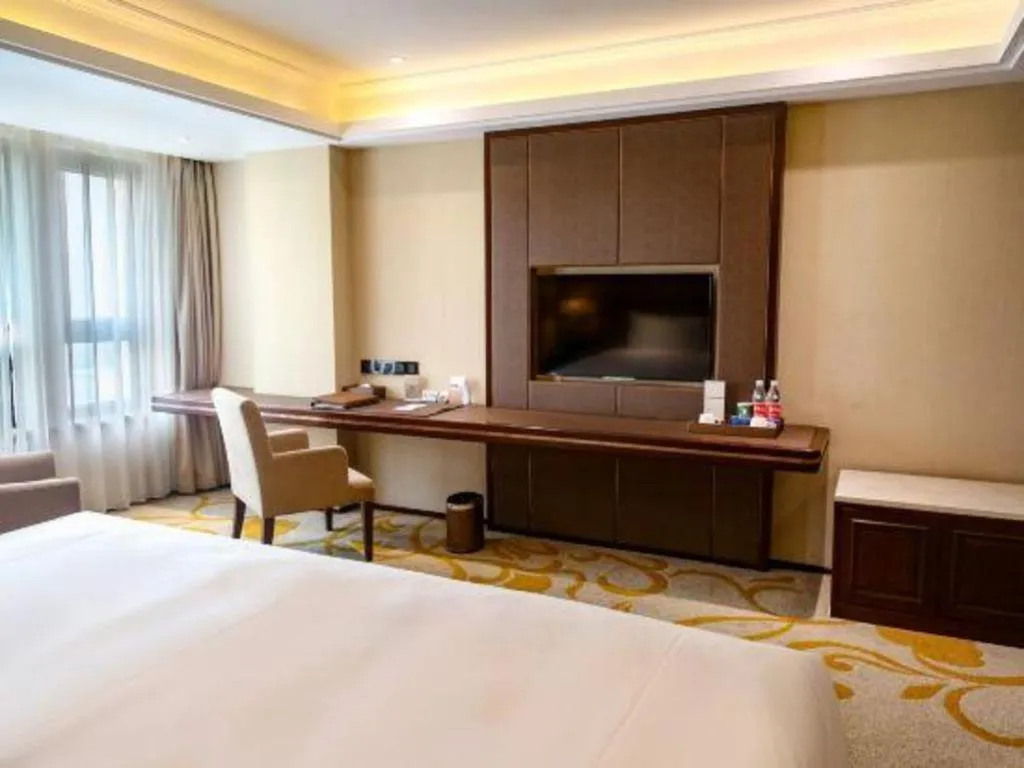 Bed in Sky World Hotel Qingdao