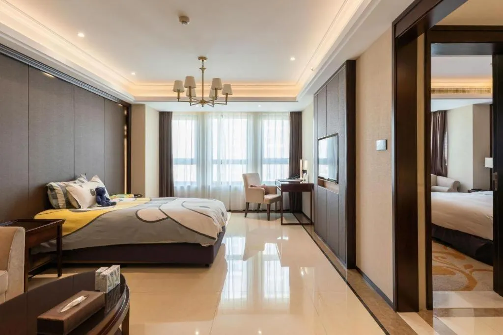 Bed in Sky World Hotel Qingdao