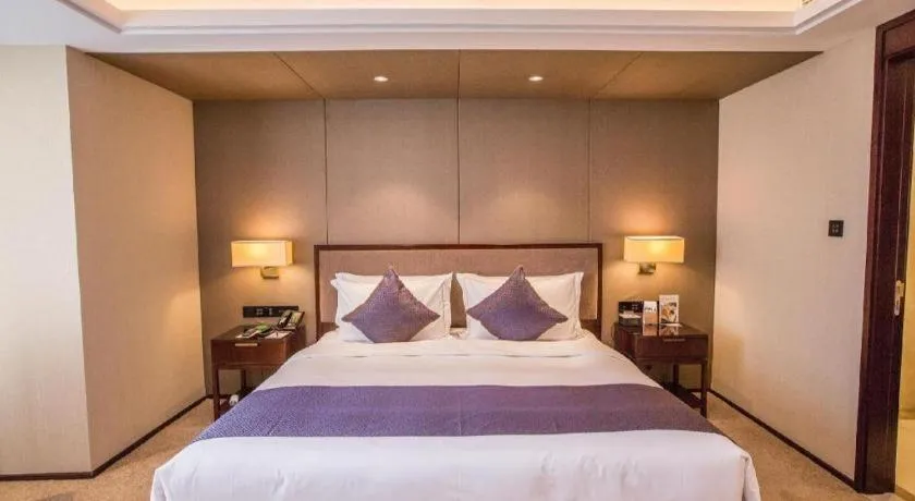 Bed in Sky World Hotel Qingdao