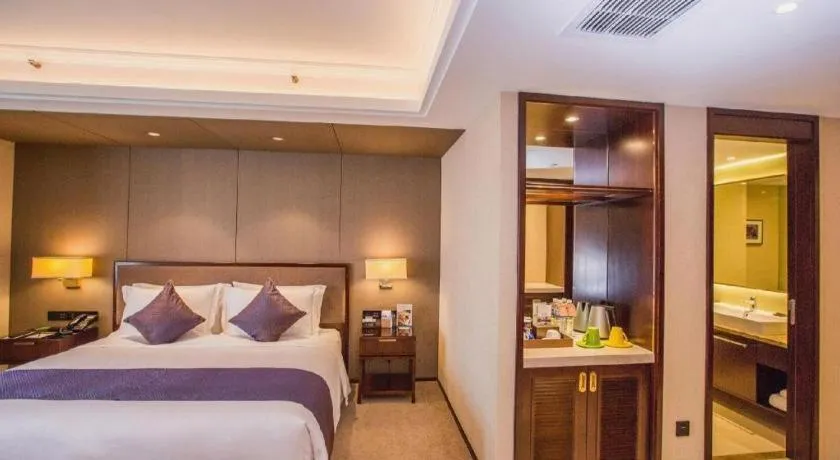 Bed in Sky World Hotel Qingdao