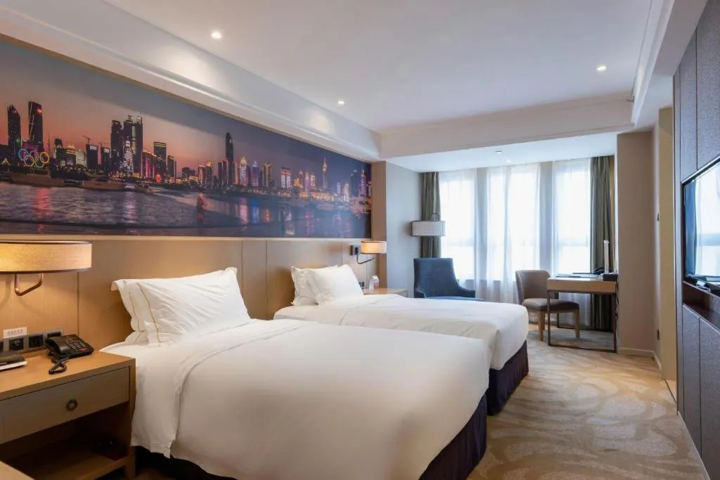 Bed in Sky World Hotel Qingdao