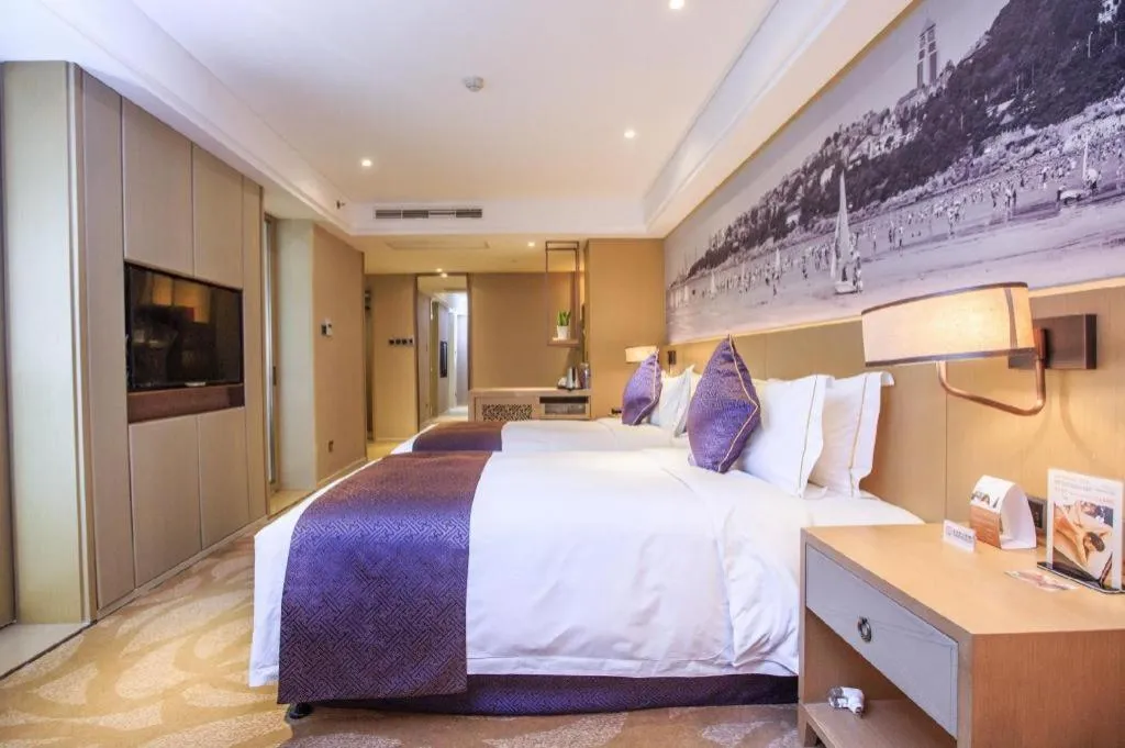 Bed in Sky World Hotel Qingdao