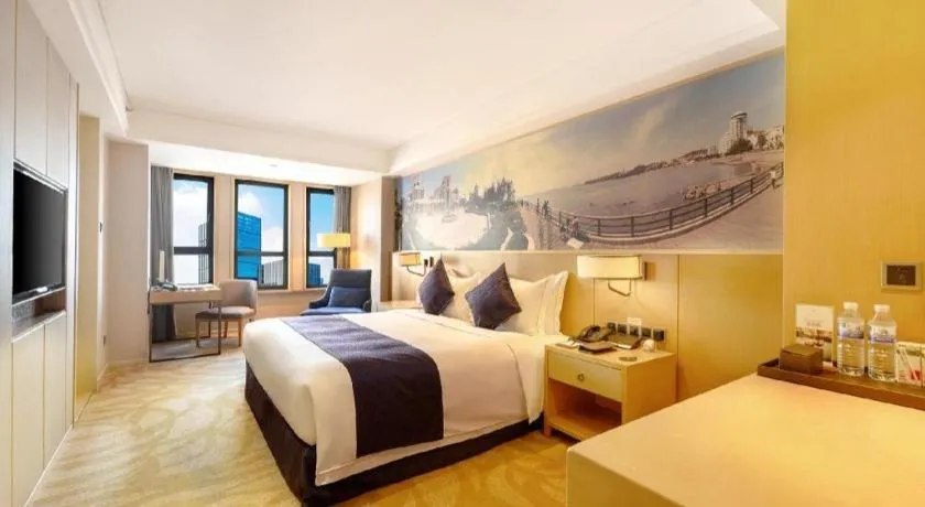 Bed in Sky World Hotel Qingdao