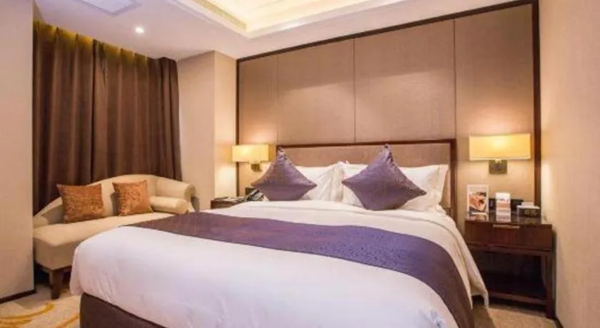 Bed in Sky World Hotel Qingdao