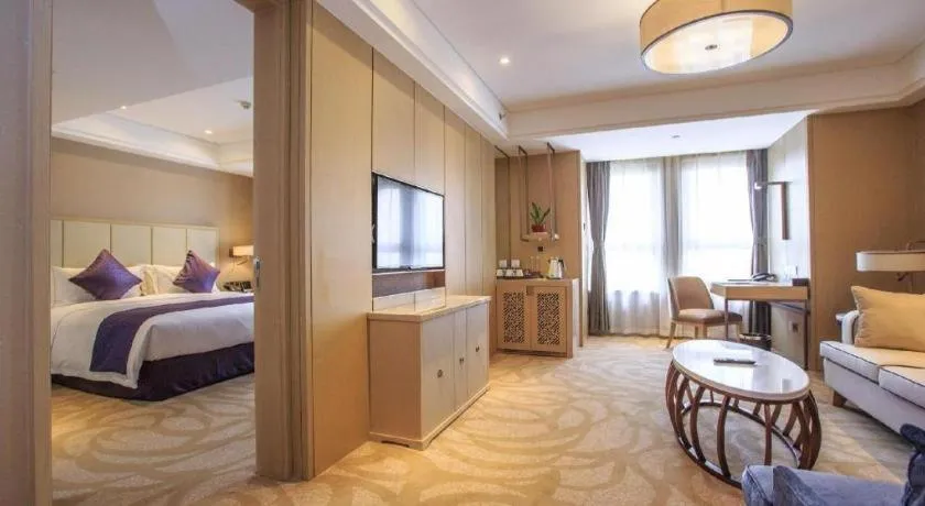 Bed in Sky World Hotel Qingdao