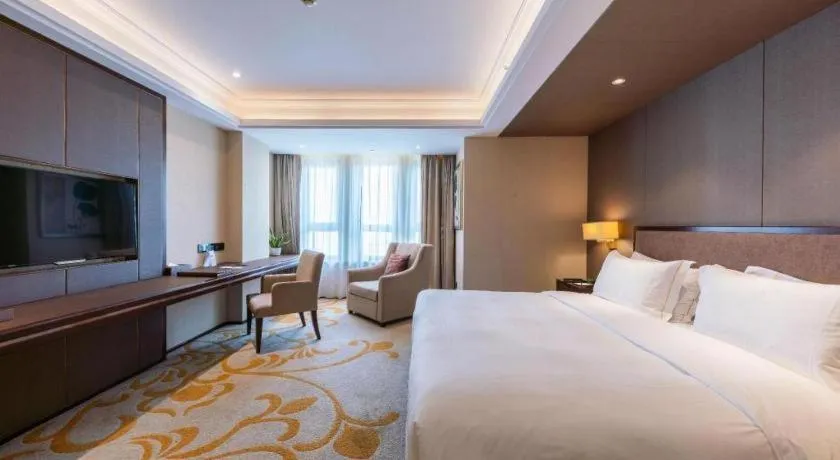 Bed in Sky World Hotel Qingdao