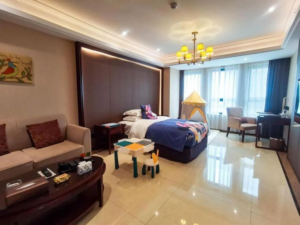 Bed in Sky World Hotel Qingdao