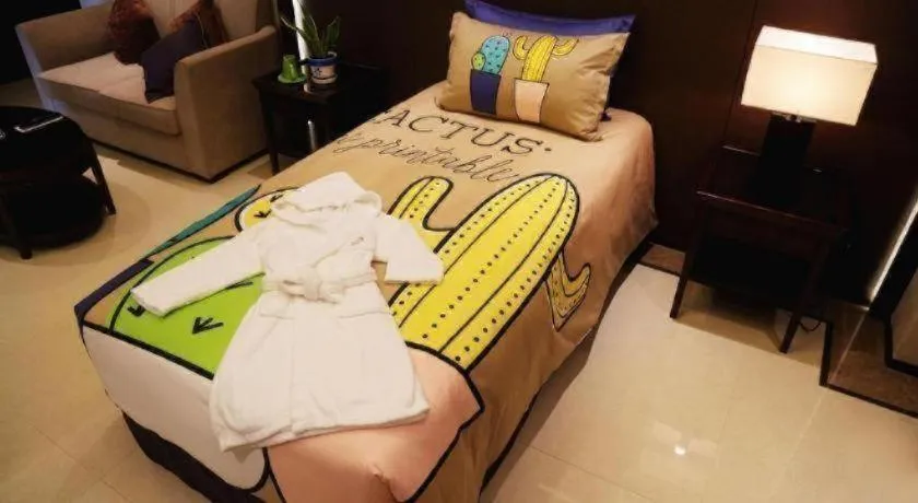 Bed in Sky World Hotel Qingdao