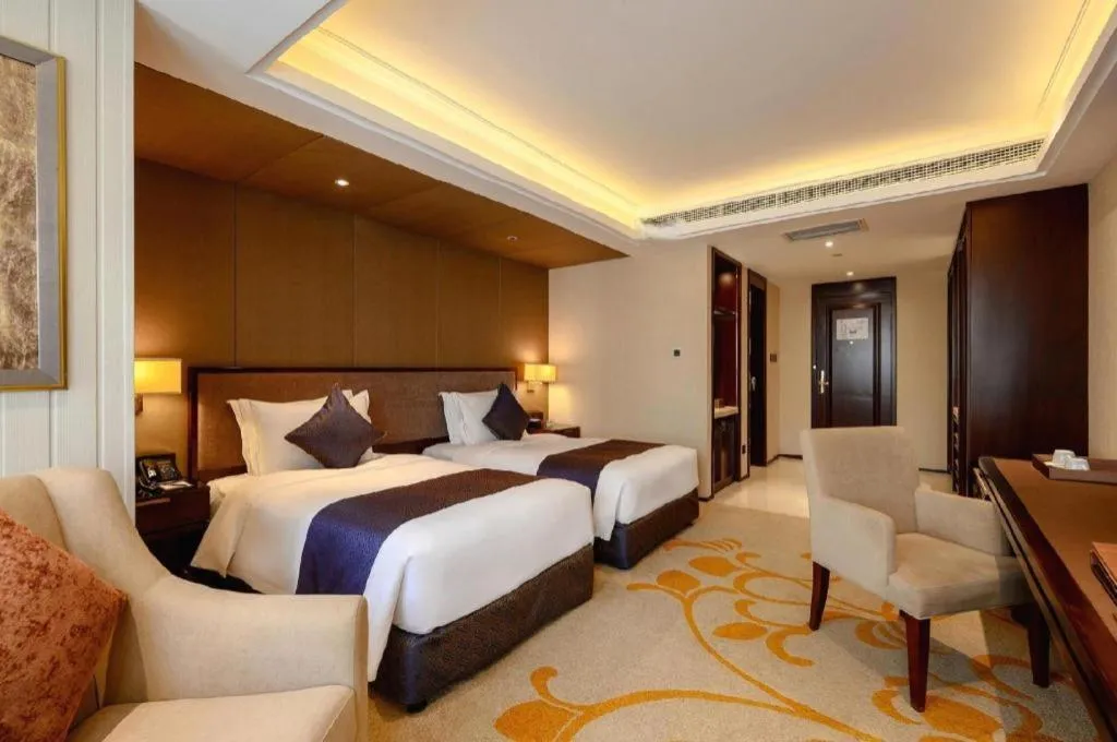 Bed in Sky World Hotel Qingdao