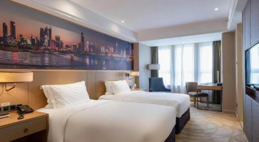 Bed in Sky World Hotel Qingdao