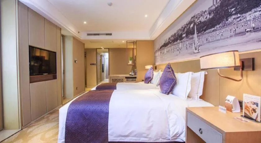 Bed in Sky World Hotel Qingdao