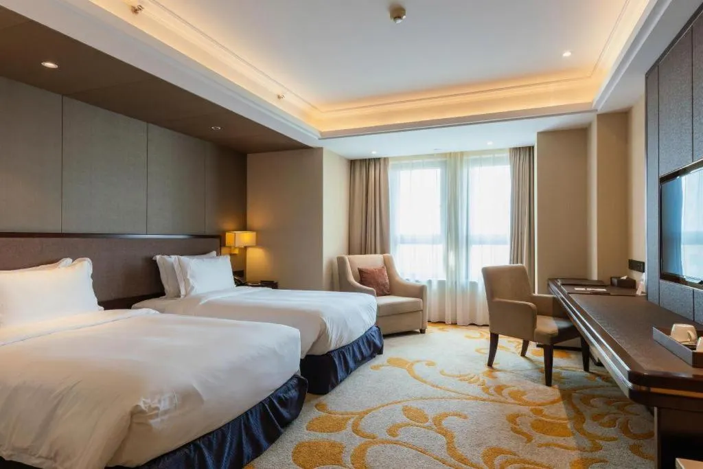 Bed in Sky World Hotel Qingdao