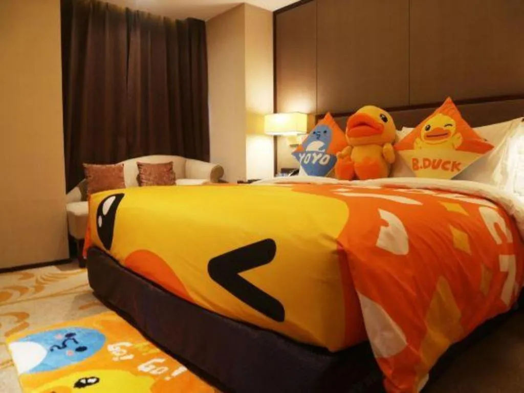 Bed in Sky World Hotel Qingdao