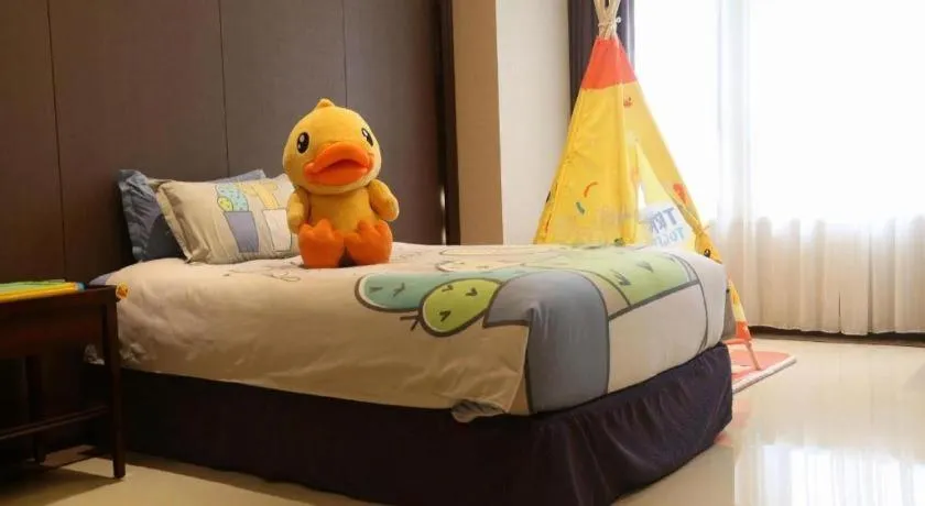 Bed in Sky World Hotel Qingdao