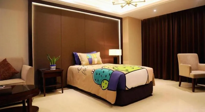 Bed in Sky World Hotel Qingdao