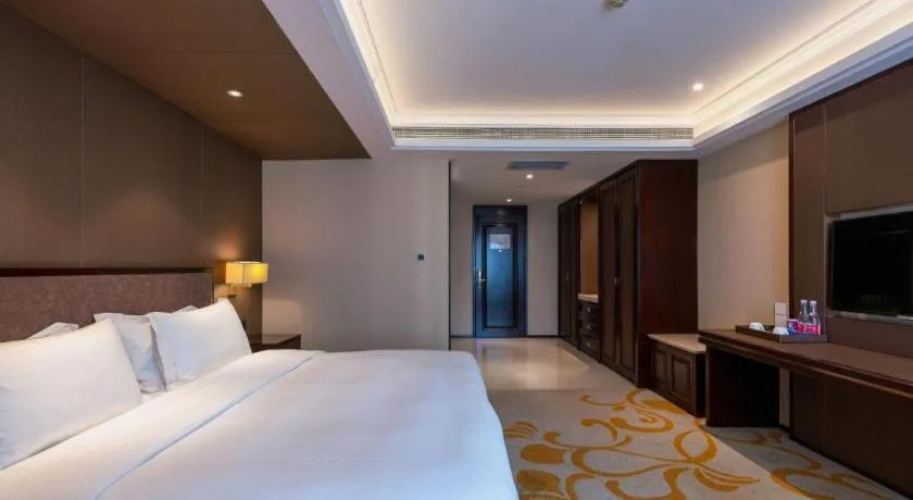 Bed in Sky World Hotel Qingdao
