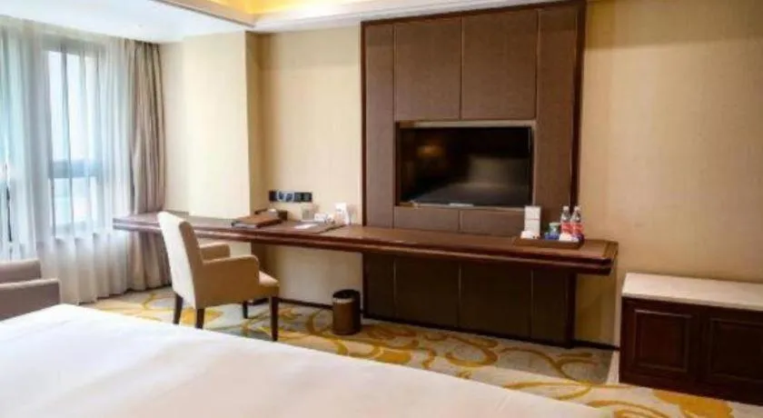 Bed in Sky World Hotel Qingdao