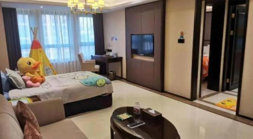 Bed in Sky World Hotel Qingdao