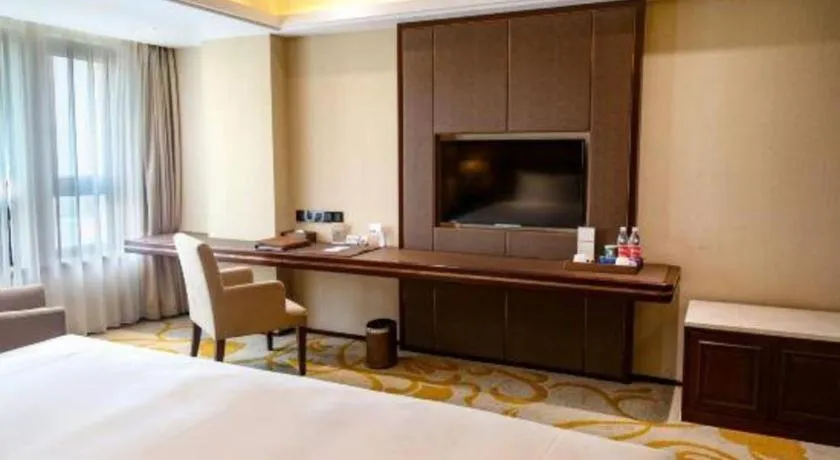 Bed in Sky World Hotel Qingdao